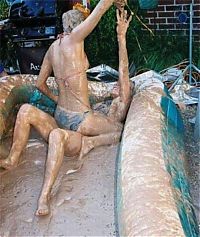 Sport and Fitness: bikini girls mud wrestling