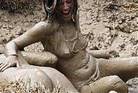 Sport and Fitness: bikini girls mud wrestling