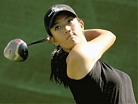 Sport and Fitness: girl playing golf