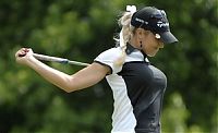 Sport and Fitness: girl playing golf