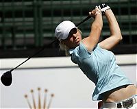 Sport and Fitness: girl playing golf