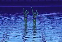 Sport and Fitness: synchronized swimming when upside down underwater