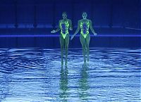 Sport and Fitness: synchronized swimming when upside down underwater