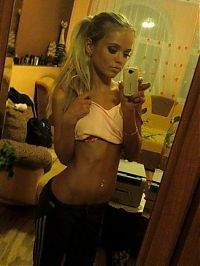 TopRq.com search results: strong fitness bodybuilding girl with abdominal six-pack belly muscles