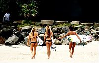 Sport and Fitness: young surfing girl