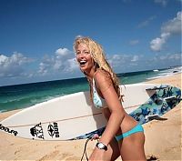 Sport and Fitness: young surfing girl