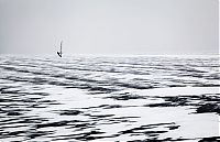 Sport and Fitness: ice windsurfing on a frozen lake