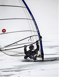 Sport and Fitness: ice windsurfing on a frozen lake