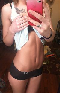 TopRq.com search results: strong fitness bodybuilding girl with abdominal six-pack belly muscles