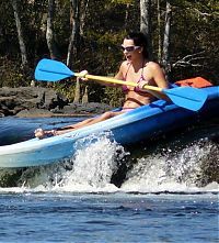 Sport and Fitness: girl with a kayak