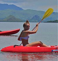 Sport and Fitness: girl with a kayak