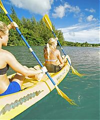 Sport and Fitness: girl with a kayak