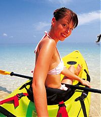 Sport and Fitness: girl with a kayak