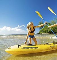 Sport and Fitness: girl with a kayak