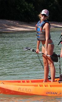 Sport and Fitness: girl with a kayak