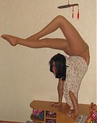 TopRq.com search results: young brunette girl doing flexible gymnastics at home