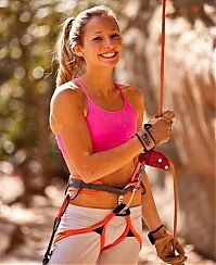 Sport and Fitness: young rock climbing girl