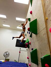 young rock climbing girl