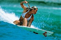 Sport and Fitness: young surfing girl