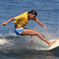 Sport and Fitness: young surfing girl