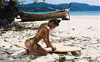 Sport and Fitness: young surfing girl