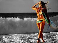 Sport and Fitness: young surfing girl