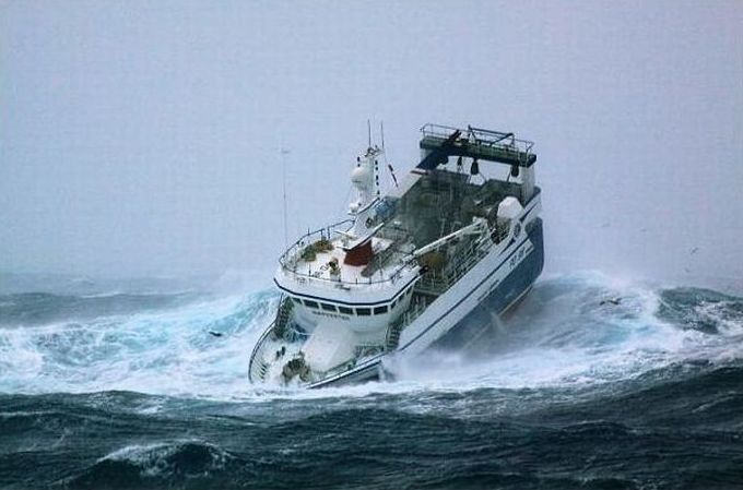 fishing ship in the middle of a storm