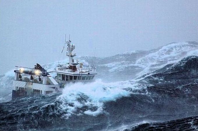 fishing ship in the middle of a storm