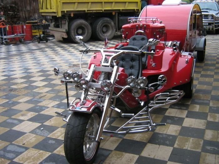 motorcycle with light travel trailer