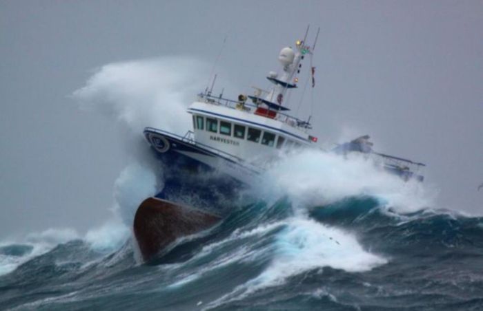 Fishing vessel in the rough waves, North Sea