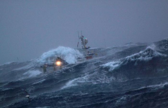 Fishing vessel in the rough waves, North Sea