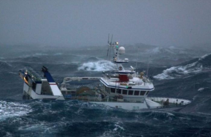 Fishing vessel in the rough waves, North Sea