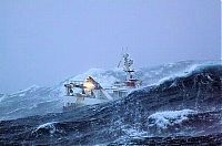 Transport: fishing ship in the middle of a storm