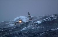 Transport: Fishing vessel in the rough waves, North Sea