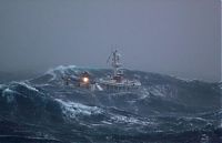 Transport: Fishing vessel in the rough waves, North Sea