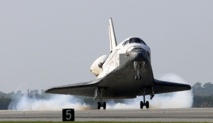 Space Shuttle Discovery home after 15-day mission