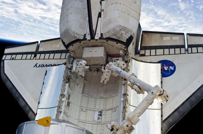 Space Shuttle Discovery home after 15-day mission