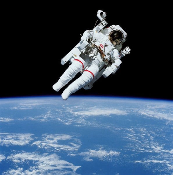 First untethered, free flight, Bruce McCandless II, naval aviator