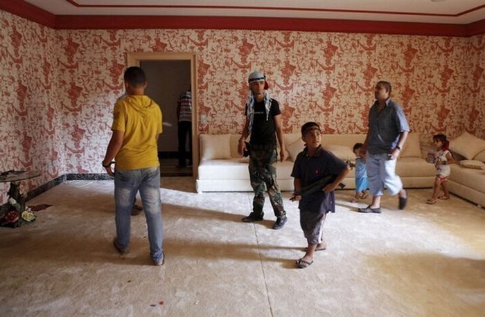 Rebels inside Muammar Muhammad al-Gaddafi villas, Libya
