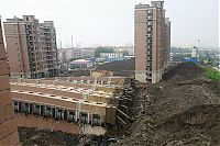 TopRq.com search results: 13-storey house collapsed, Shanghai, China