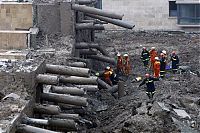 TopRq.com search results: 13-storey house collapsed, Shanghai, China