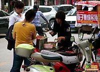 World & Travel: Sausage on a bicycle, China
