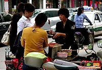 World & Travel: Sausage on a bicycle, China