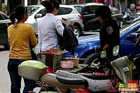 World & Travel: Sausage on a bicycle, China