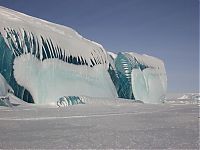 World & Travel: Blue ice from frozen waves, Antarctica