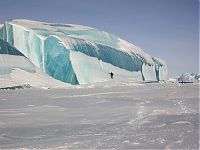 World & Travel: Blue ice from frozen waves, Antarctica