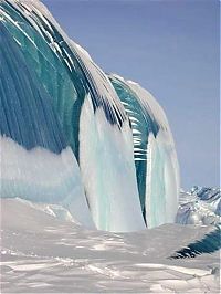 World & Travel: Blue ice from frozen waves, Antarctica