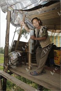 TopRq.com search results: Farmer defends his land with a canon, China