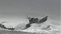 TopRq.com search results: Coast Guard on the giant waves