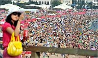 World & Travel: Overcrowded beach, China